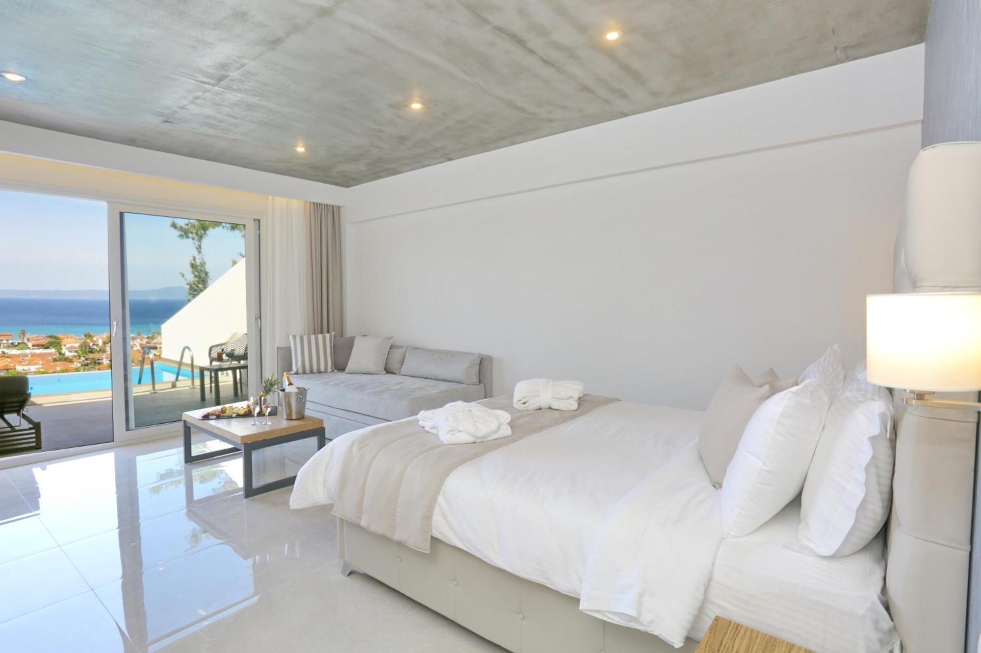 Alia Palace Hotel - Adults Only 16+ Chalkidiki Bagian luar foto Deluxe room with private pool