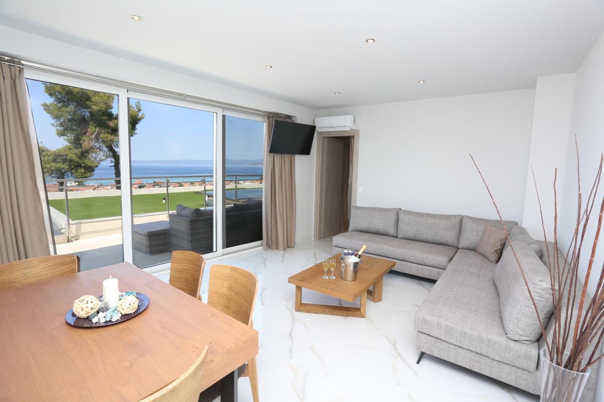Alia Palace Hotel - Adults Only 16+ Chalkidiki Bagian luar foto A living room