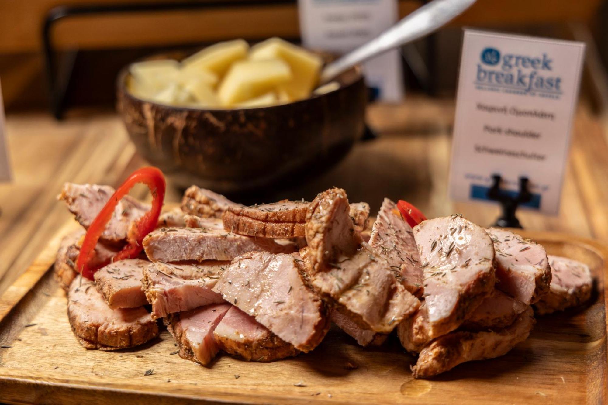 Alia Palace Hotel - Adults Only 16+ Chalkidiki Bagian luar foto Pork prepared at the 2019 Minnesota Pork Convention